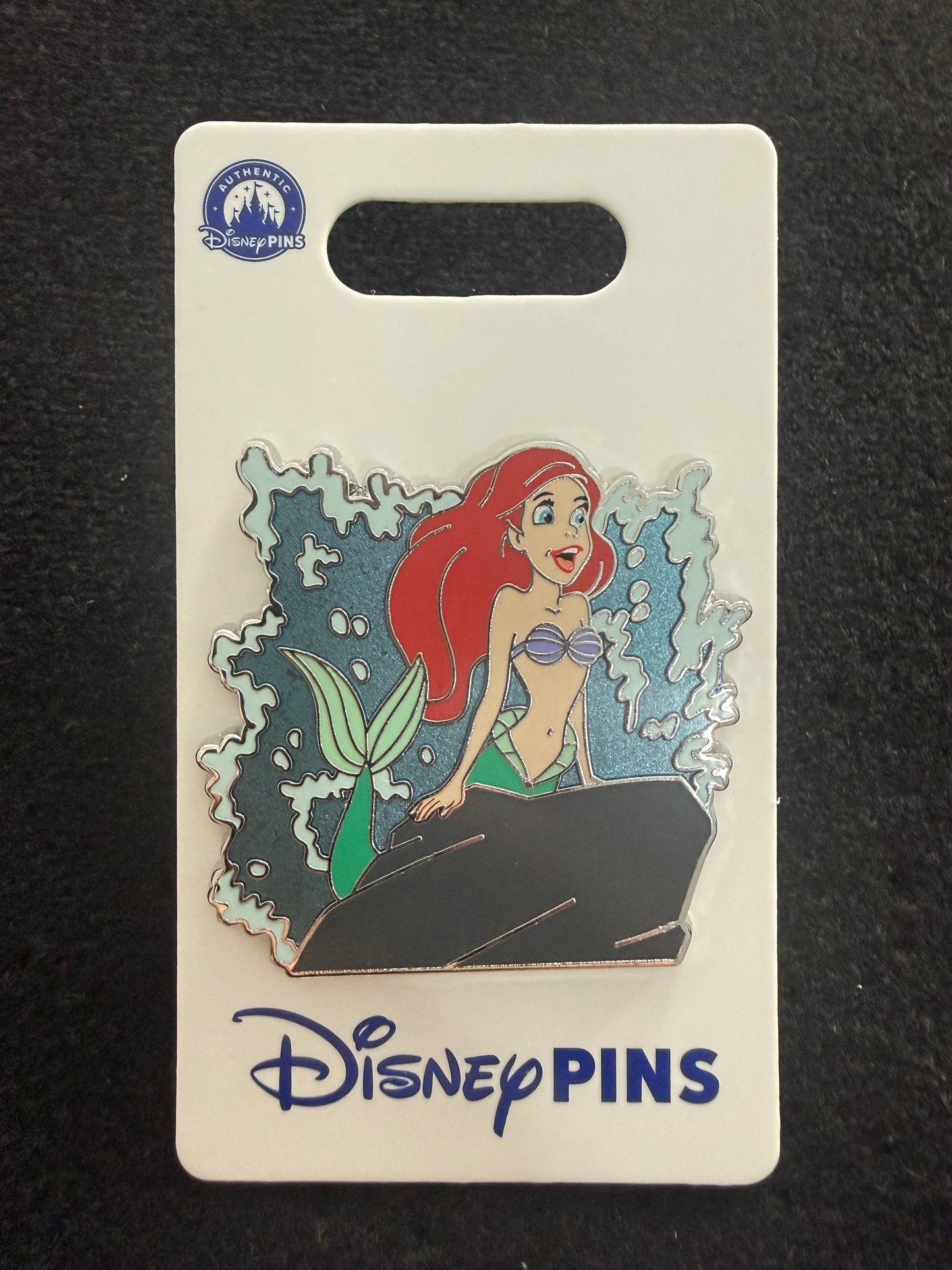 Ariel Singing On A Rock